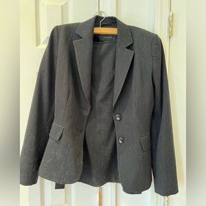 Suit: skirt jacket Tahari
